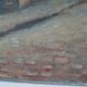 Oil on cardboard "The Street" signed and dated "Gillot 1918"