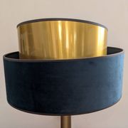 Brass lamp with asymmetrical velvet shade