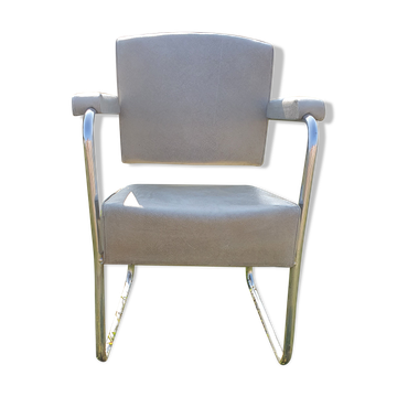 Fauteuil gris usure skai voir photo ossature tubulaire pieds traineaux.
