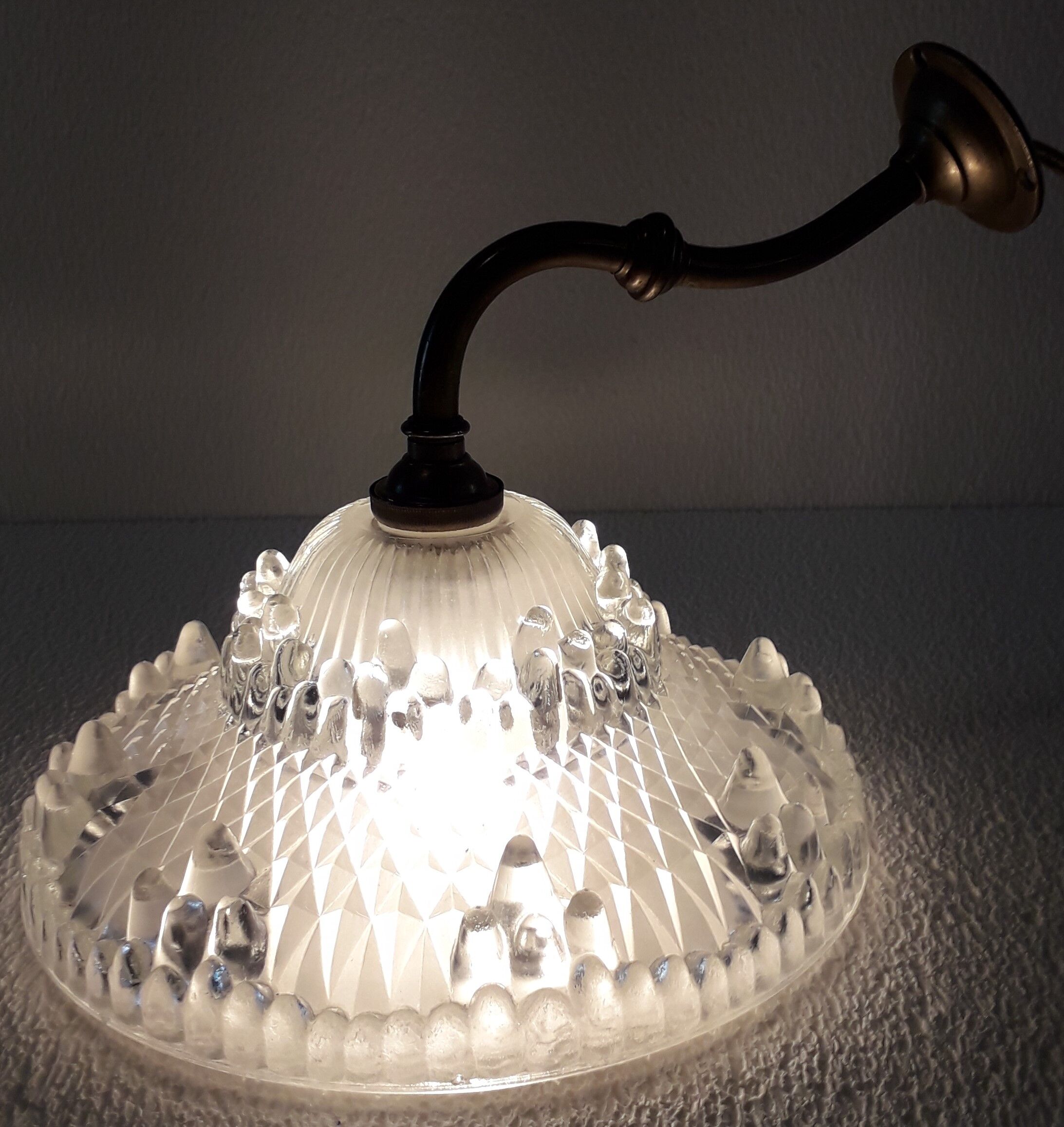 Glass and art deco brass wall lamp