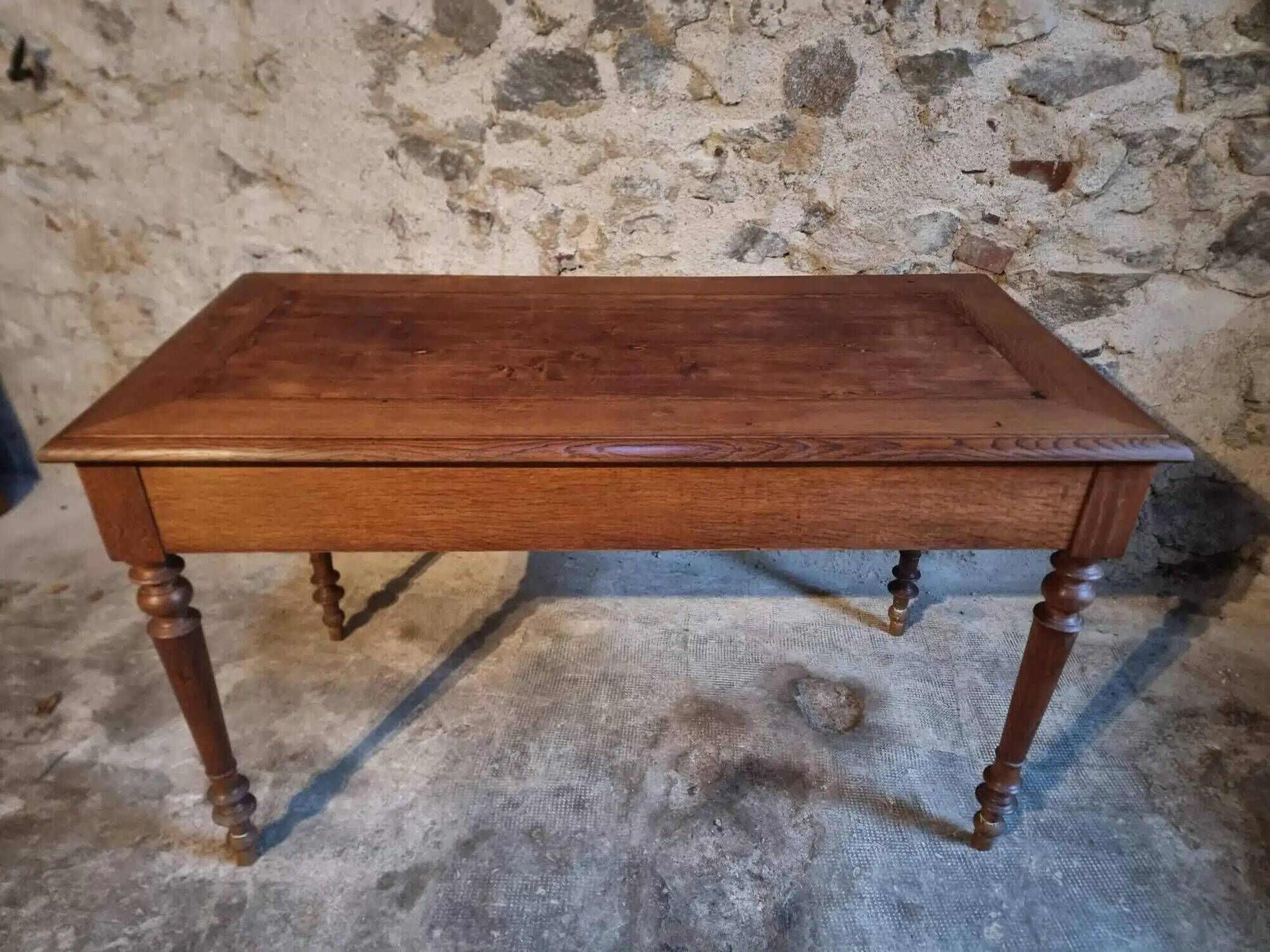 Antique French writing desk in oak with two drawers, 1920s.