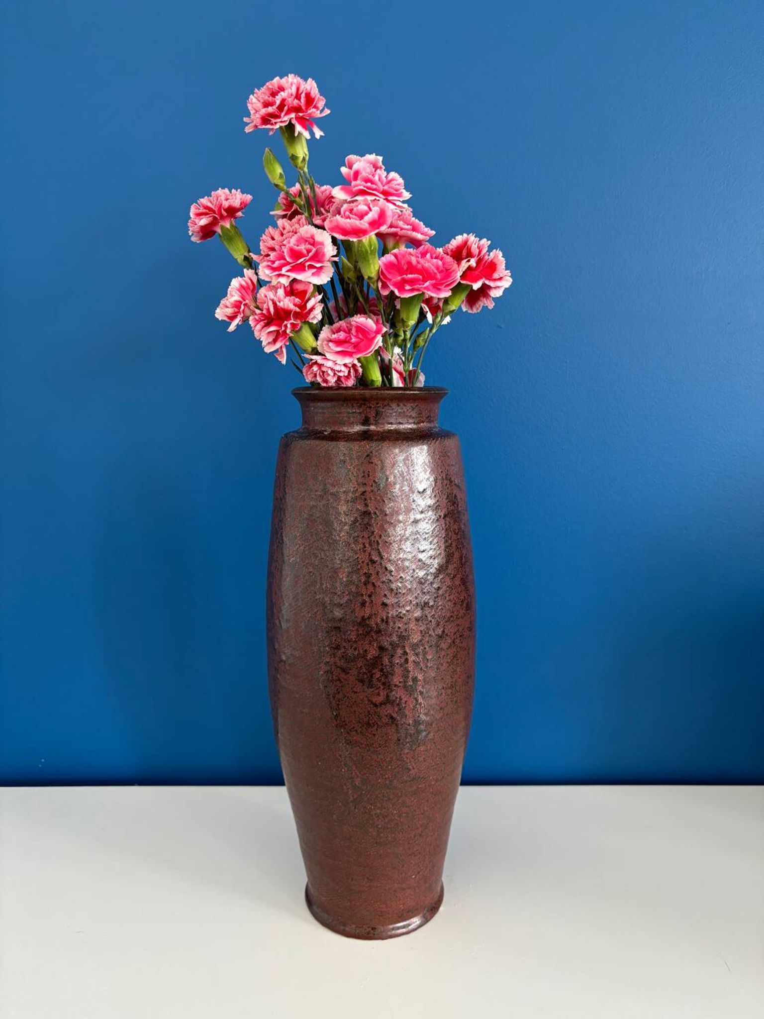 Large textured dark ceramic vase