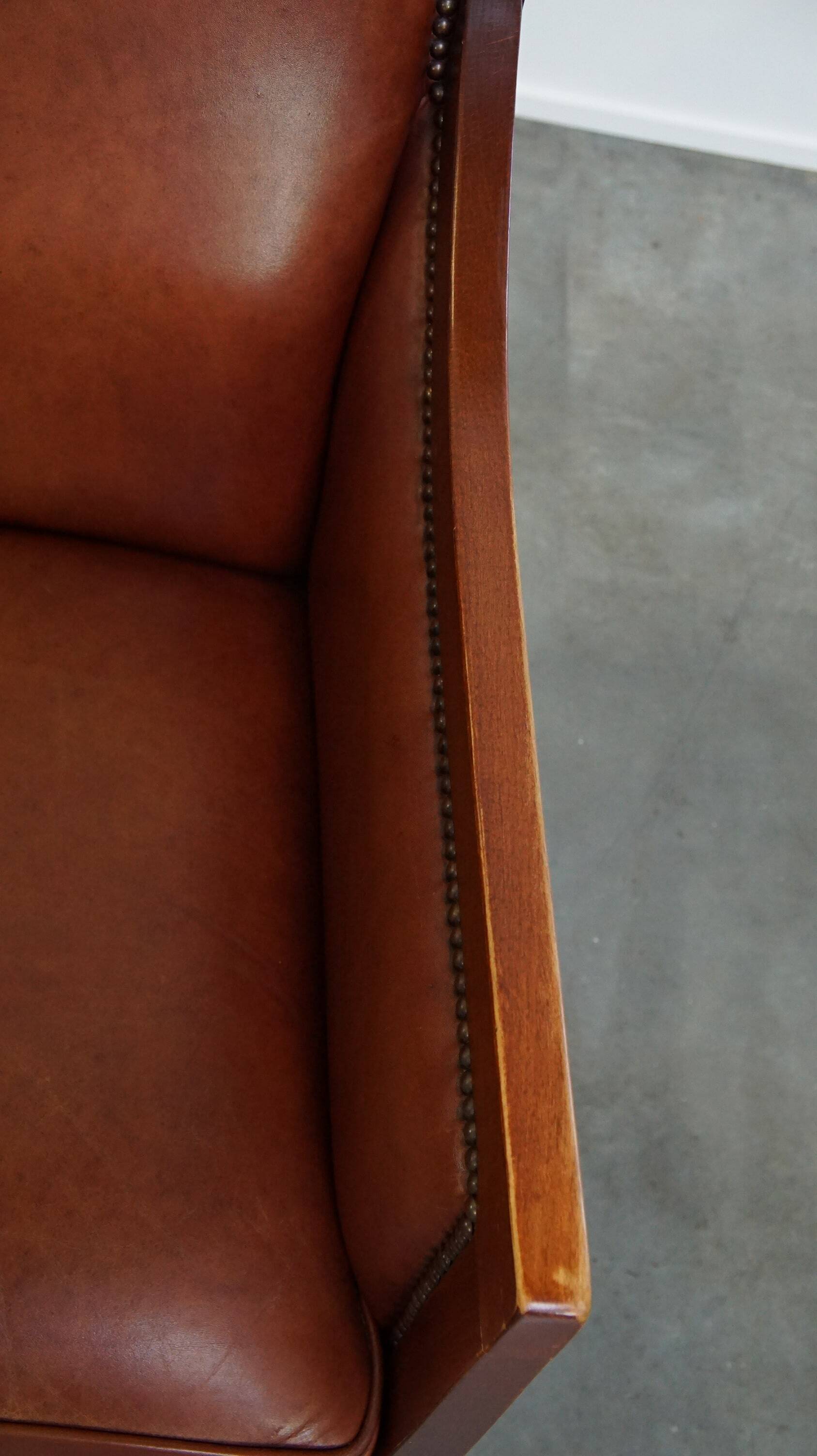 Ensemble majestueux et luxueux de 4 fauteuils design Art Déco en cuir de vachette couleur cognac