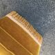 Gold velvet pouf with fringes