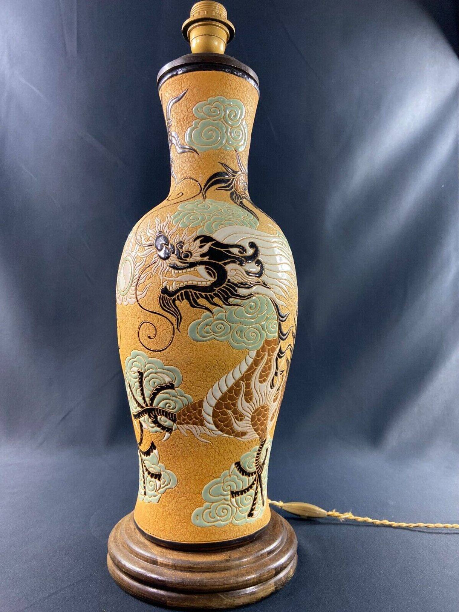 Very large dragon lamp on a yellow background in well-fired Vietnamese stoneware.
