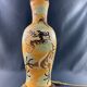 Very large dragon lamp on a yellow background in well-fired Vietnamese stoneware.