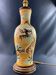 Very large dragon lamp on a yellow background in well-fired Vietnamese stoneware.