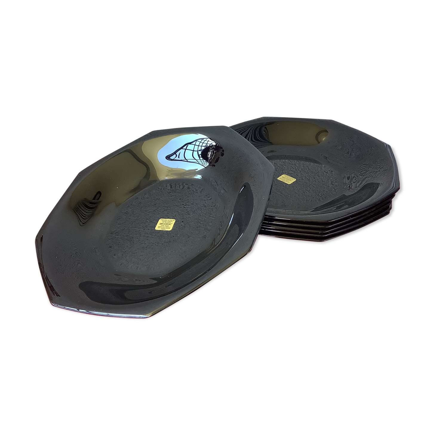 Art Deco-style black Arcoroc octime plates