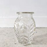Small transparent molded glass vase