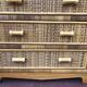 Vintage rattan chest of drawers has 3 drawers.