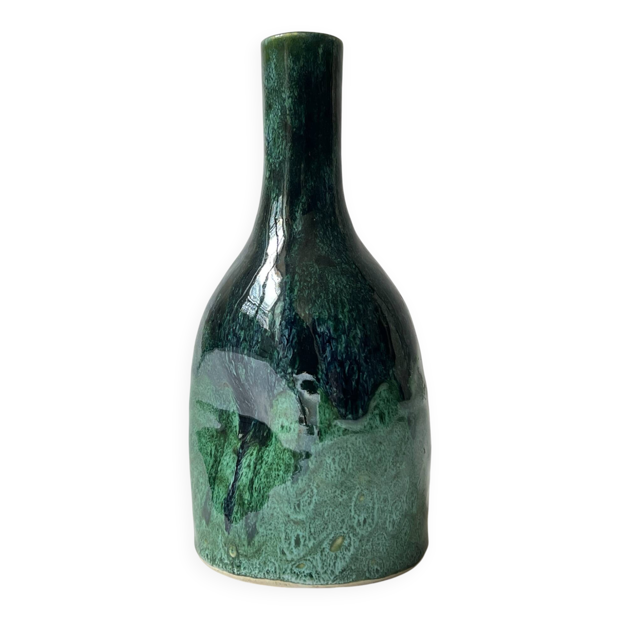 Ceramic vase with a glazed blue/green finish.