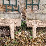 Pair of cement planters in faux wood finish