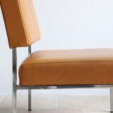 Modernist armchair in chromed metal and imitation leather, 50s/60s