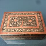 Old box in chiseled and carved brass