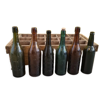 Old french wooden case with 6 old bottles. from the 20th century