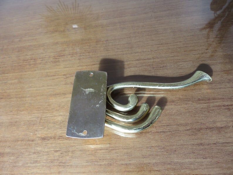 70s brass swivel coat door