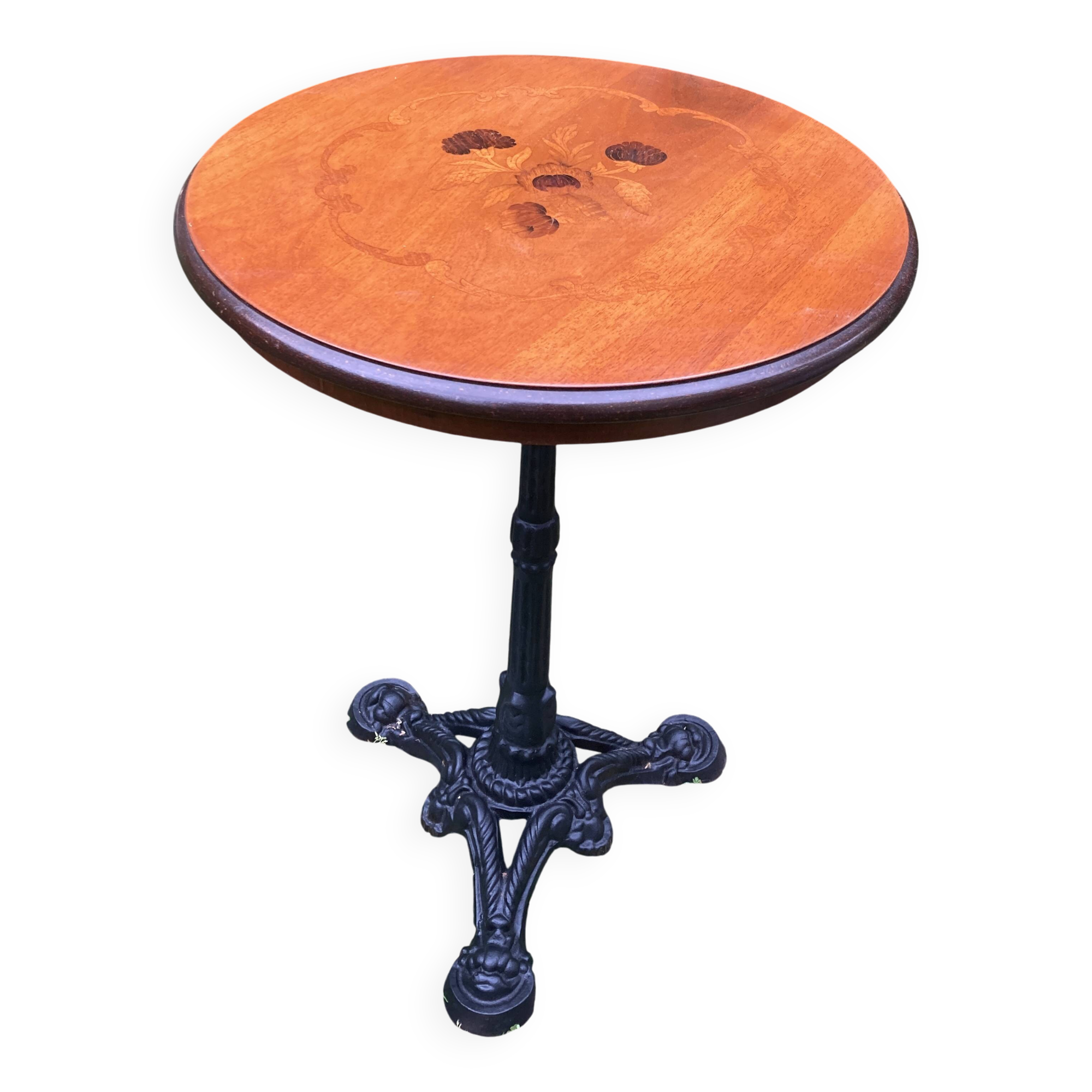 Pedestal table with inlaid top and flower decoration