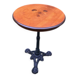 Pedestal table with inlaid top and flower decoration