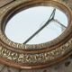 Miroir oval en bois doré XIXeme 46cm