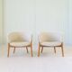 Mid-century lounge chairs in sheepskin/shearling and stained wood, Sweden, 1962.