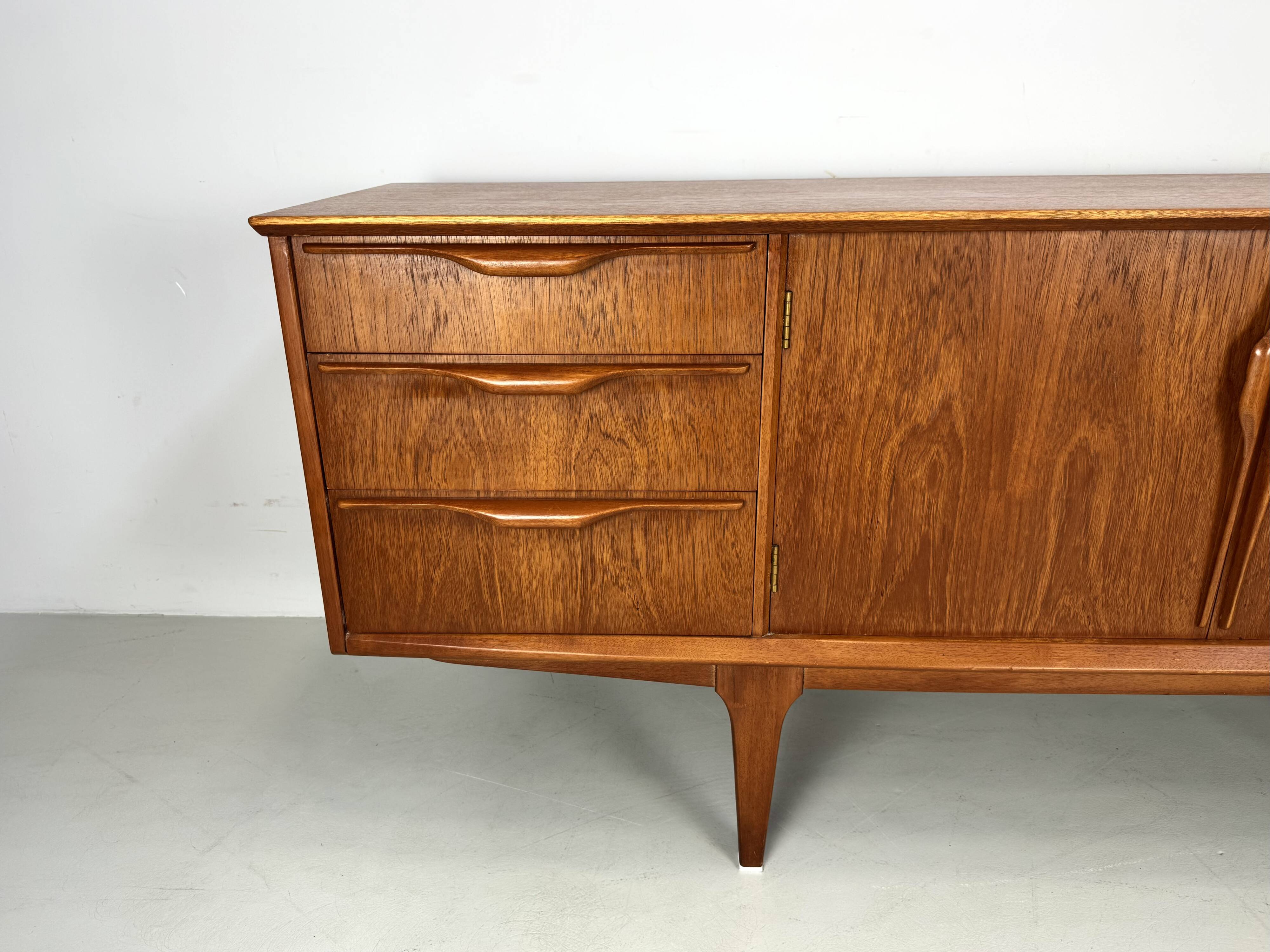Vintage sideboard by Jentique from the 1960s .