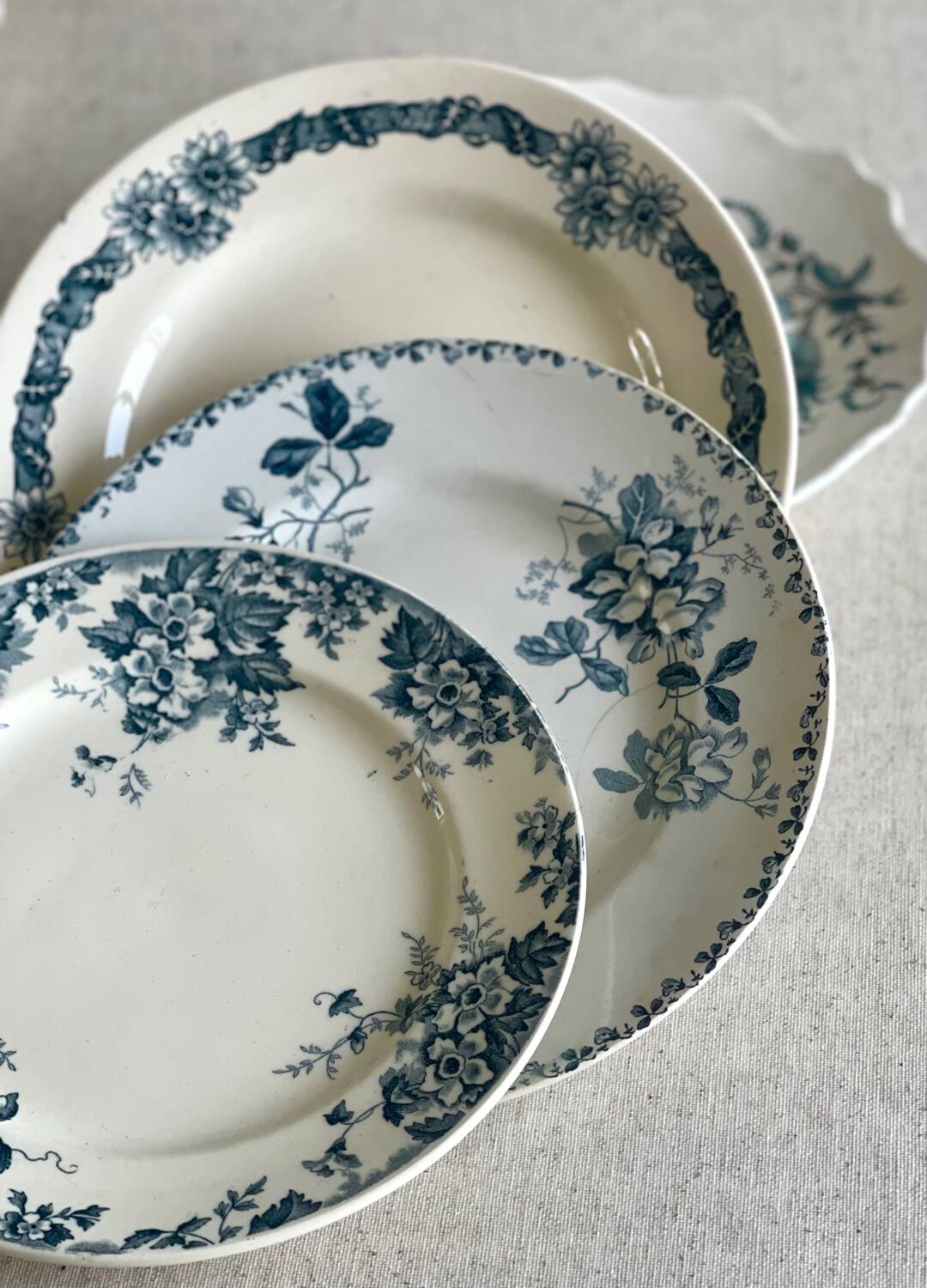 9 mismatched blue ironstone plates