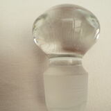small glass decanter with its handle and spout