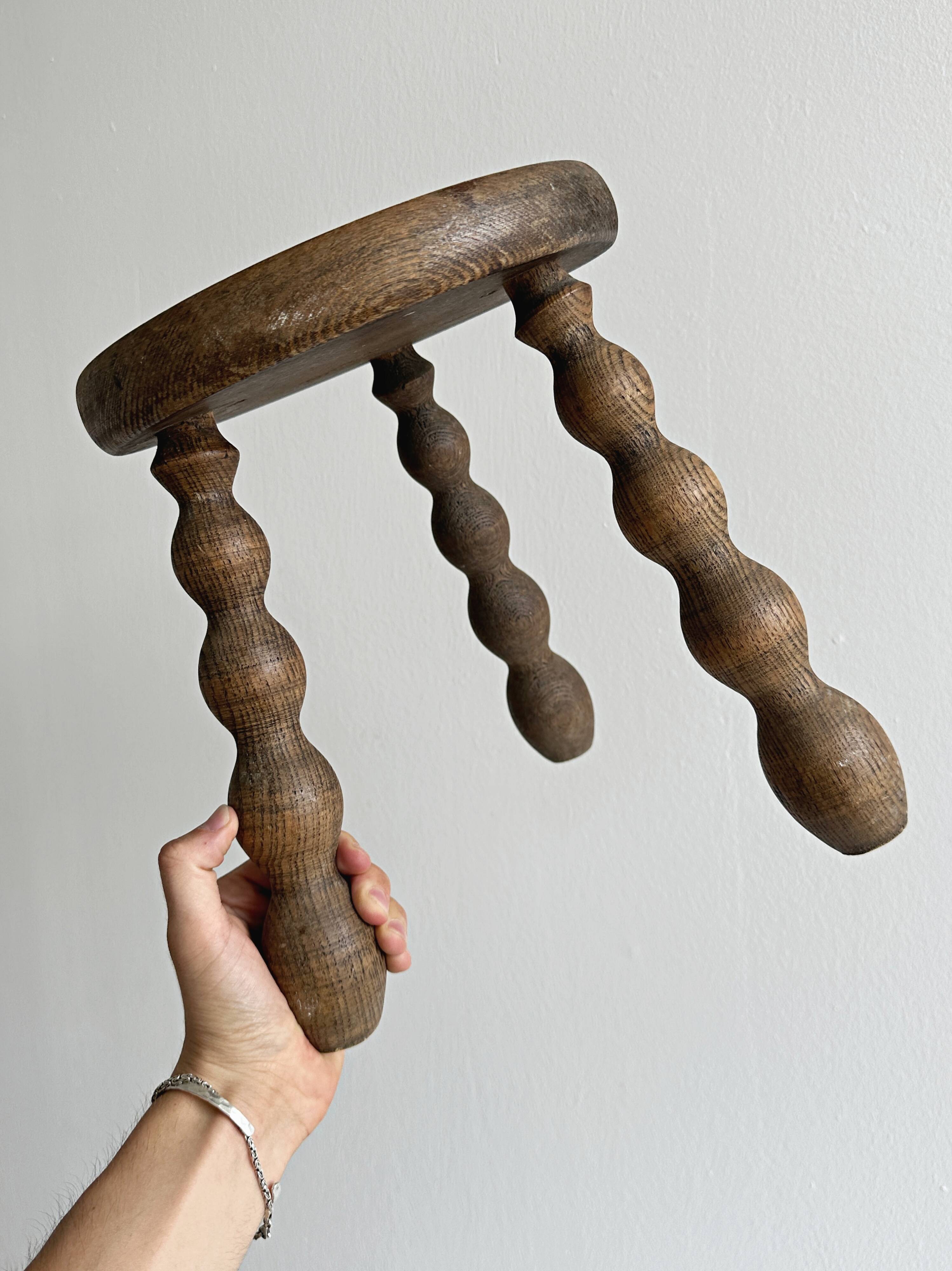 Antique wooden tripod stool