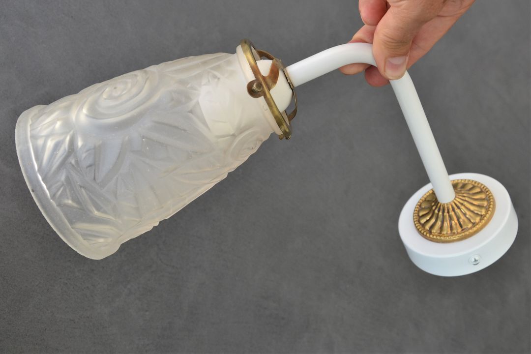 White and gold art deco wall lamp