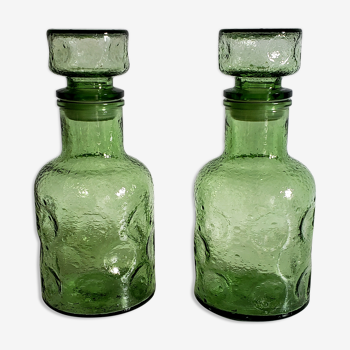 Pair of green decanters