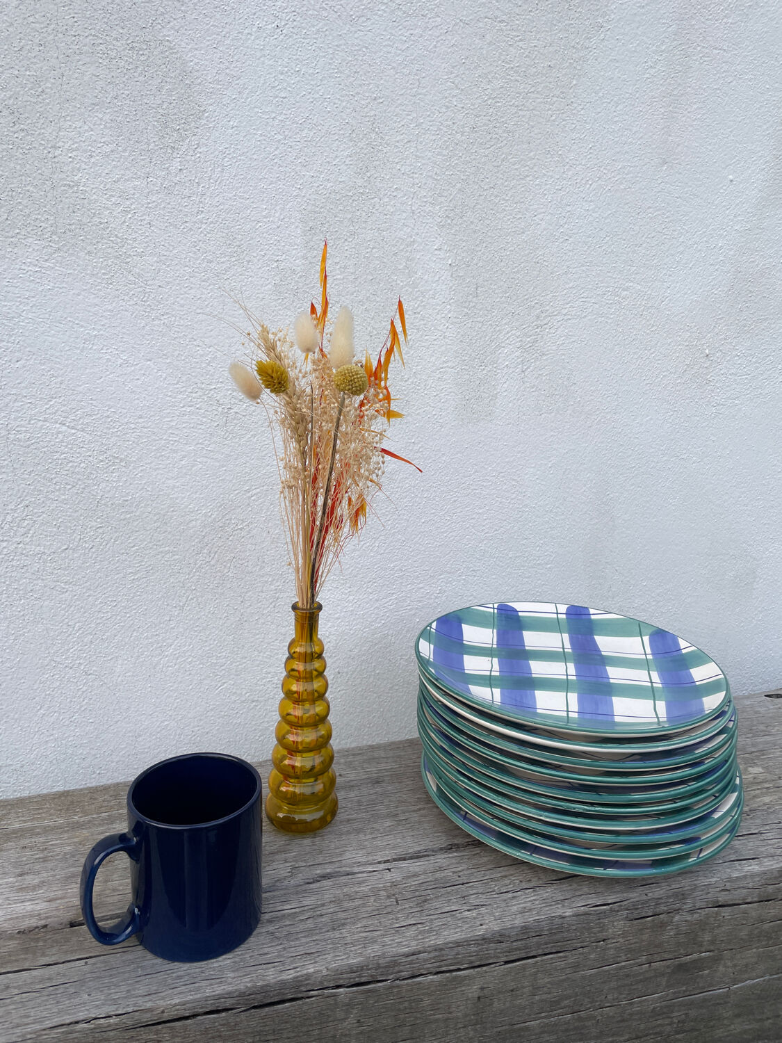 10 blue and green checked ceramic plates