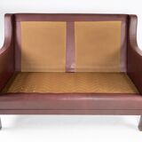 Two seater sofa, with red brown leather by Stouby Furniture