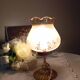 Bronze foot table lamp, satin amber lampshade, circa 1960