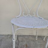 Pair of wrought iron garden chairs, antique manufacture