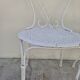 Pair of wrought iron garden chairs, antique manufacture