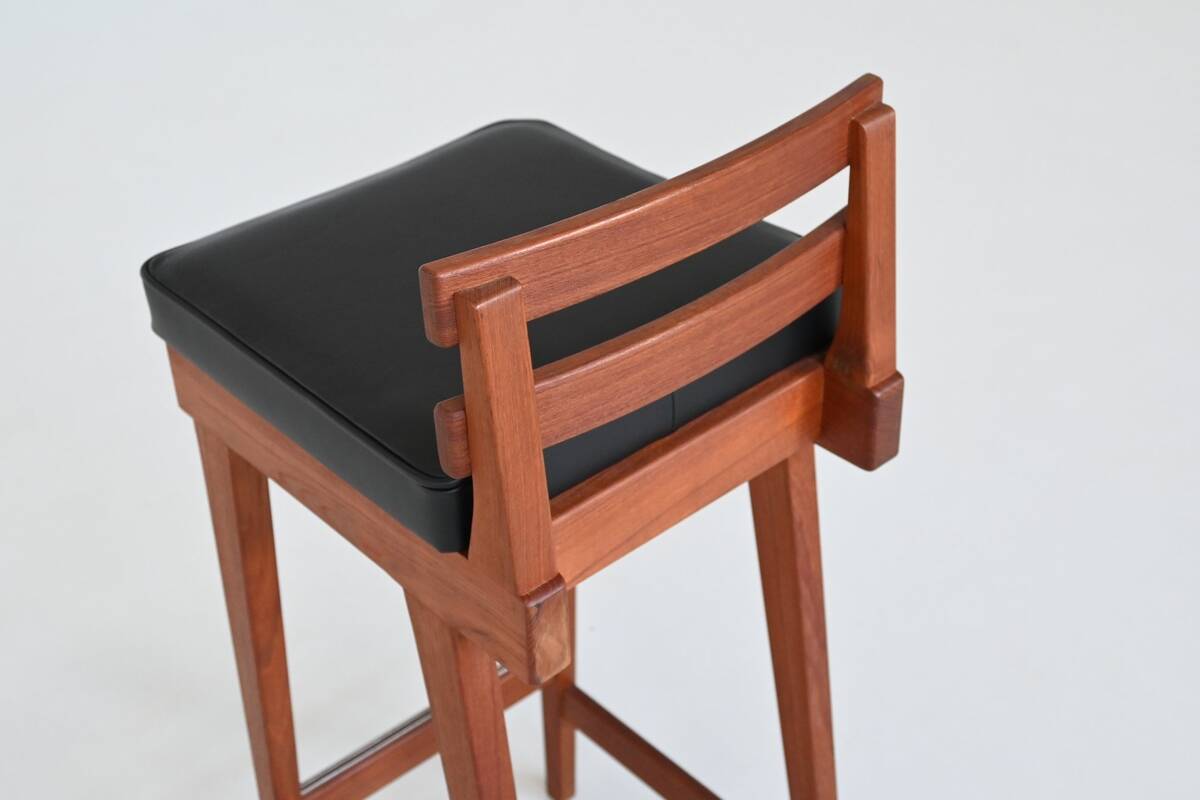 Erik Buck set of three bar stools in teak and leather Dyrlund Denmark 1960