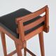 Erik Buck set of three bar stools in teak and leather Dyrlund Denmark 1960
