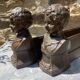 Pair of antique cast iron fire dogs "The Conquering Love"