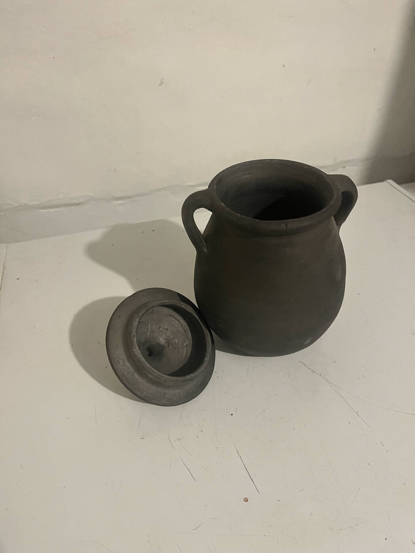 Vintage black ceramic covered pot signed Gómez Miranda — Pottery a
