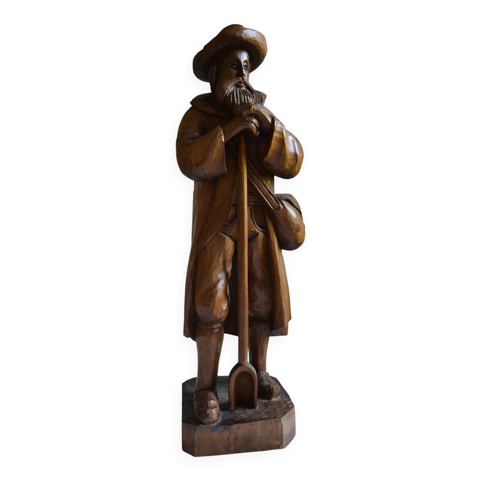 Large wooden sculpture of a man with his grain shovel 52 cm