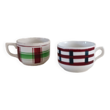 2 mismatched iron earth cups