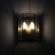 Wall sconce in brass and glass