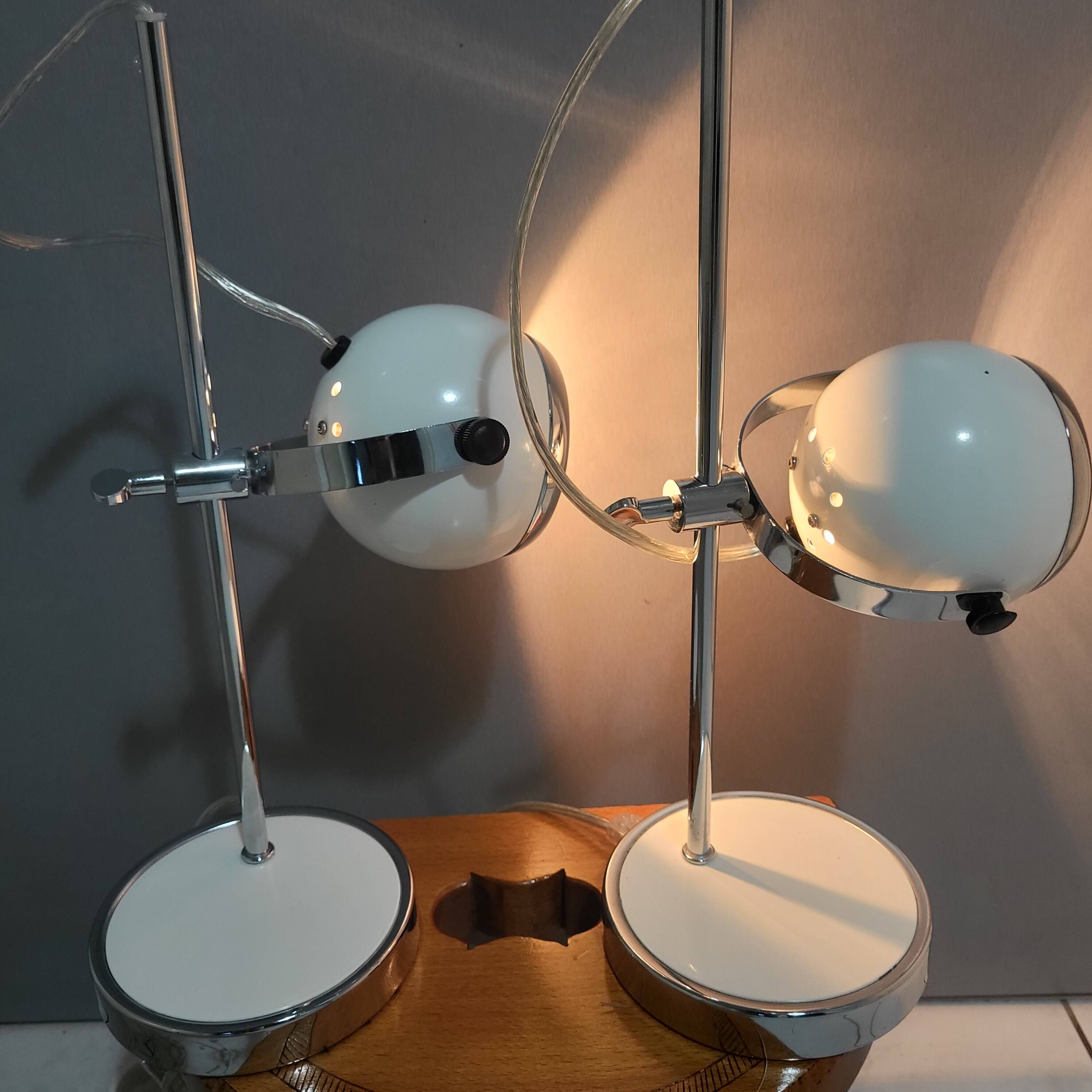 White and chrome metal eye ball lamps