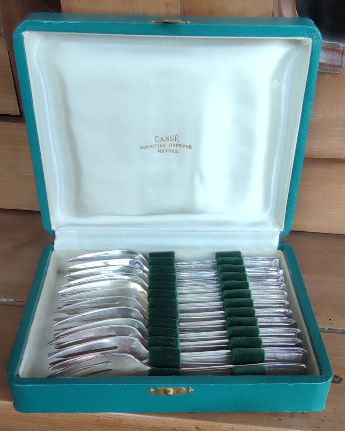 12 old silver-plated oyster forks