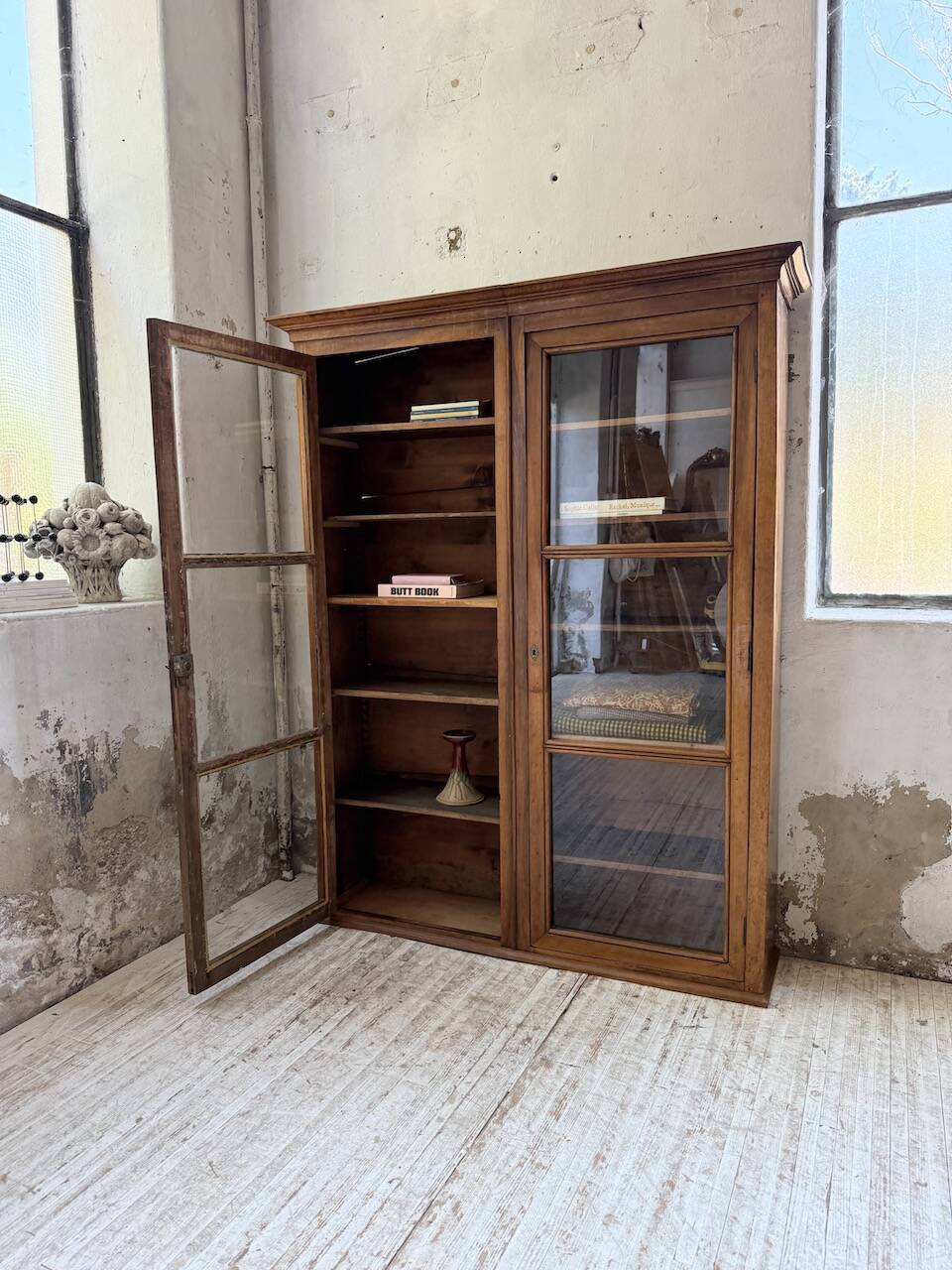 Glass-fronted walnut library 1900