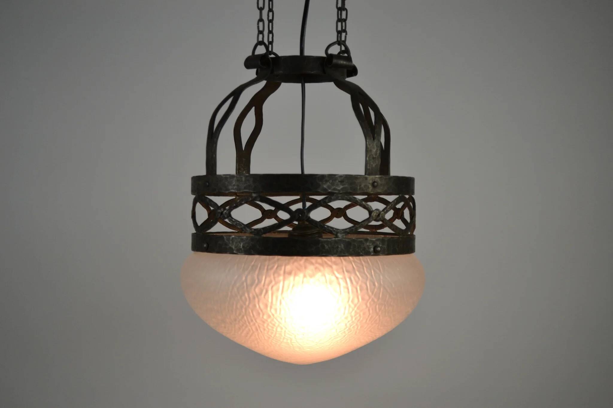 Ceiling lamp, hand-forged hammered iron with glass shade, early 20th century, Sweden