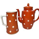 Sarreguemines, two red earthenware jugs with polka dots circa 1940