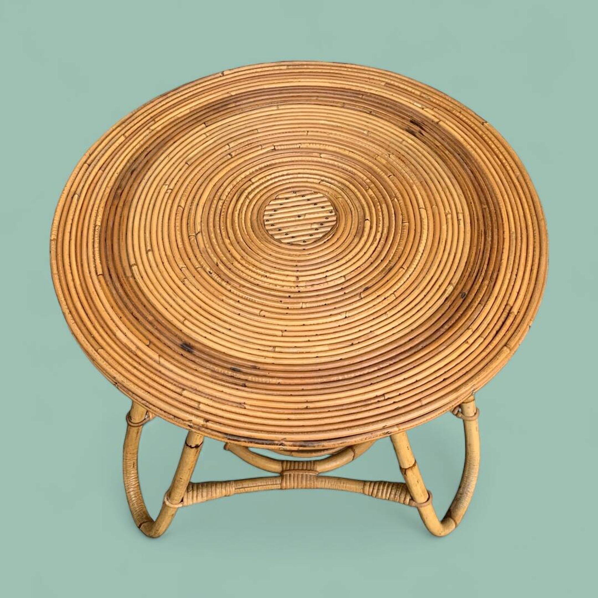 Pair of tripod coffee tables in rattan from the 1950s.