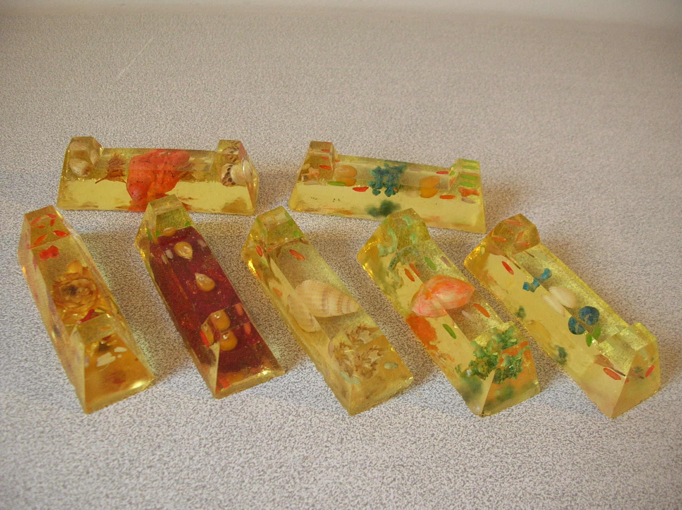 Set of 7 old knife rests 1970s resin inlays