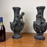 François Moreau: Pair of vases with Napoleon III period characters in regula with bronze patina